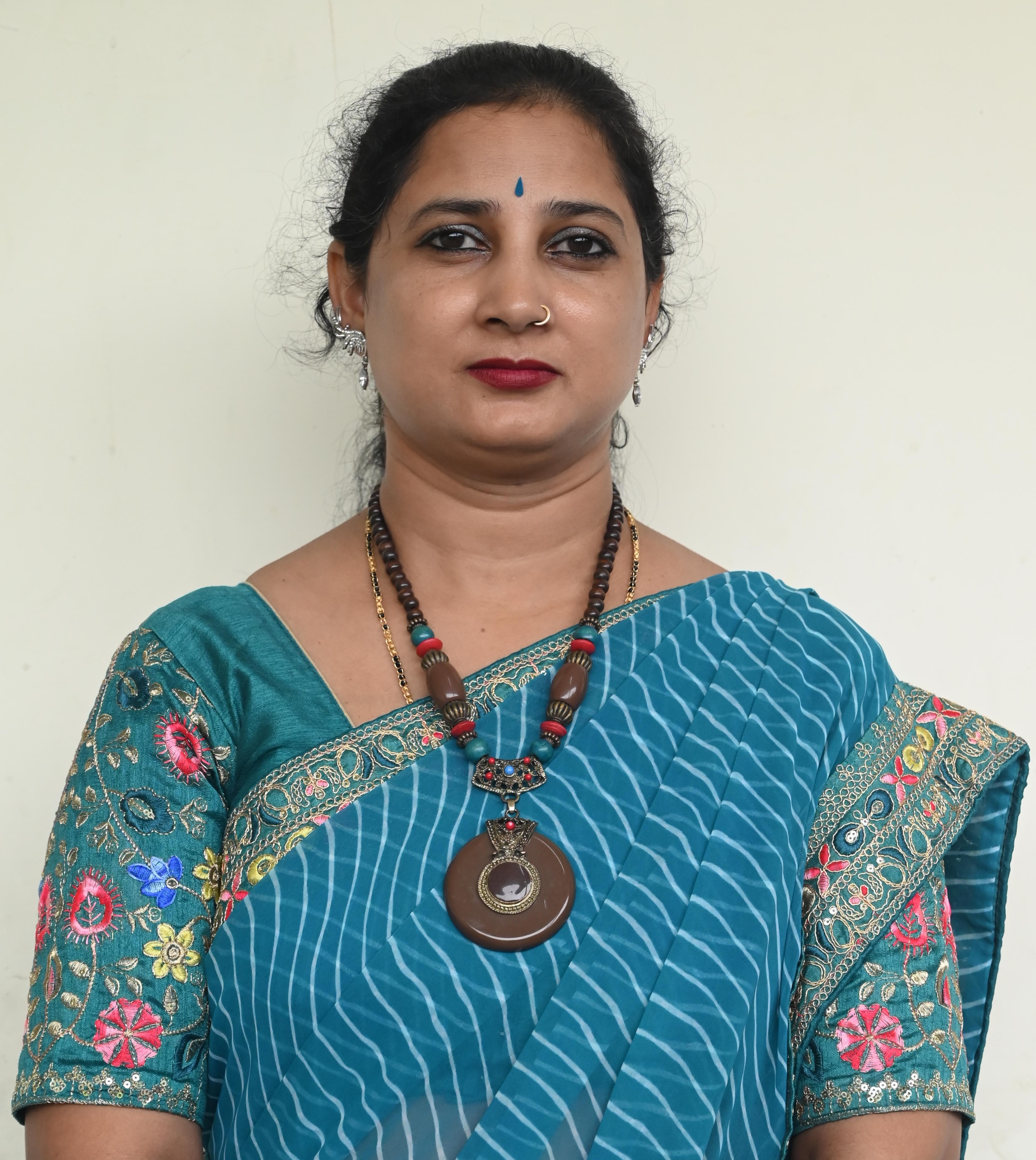 Mrs. Rekha I